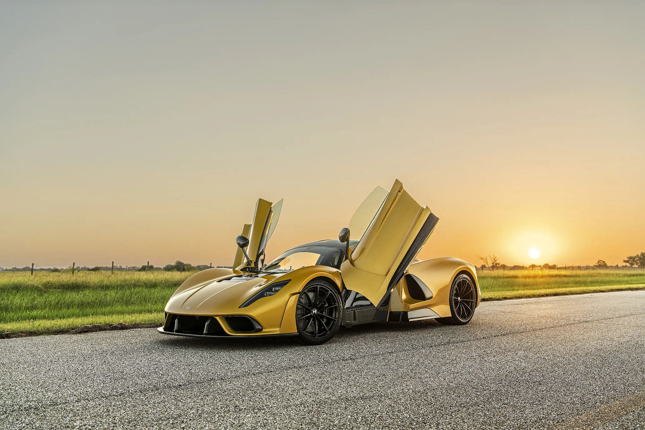 Yellow 2020 Hennessey Venom F5 front with doors open